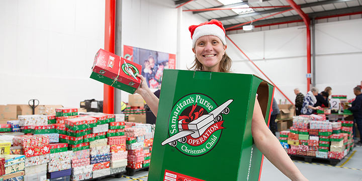 Volunteer wearing shoebox costume