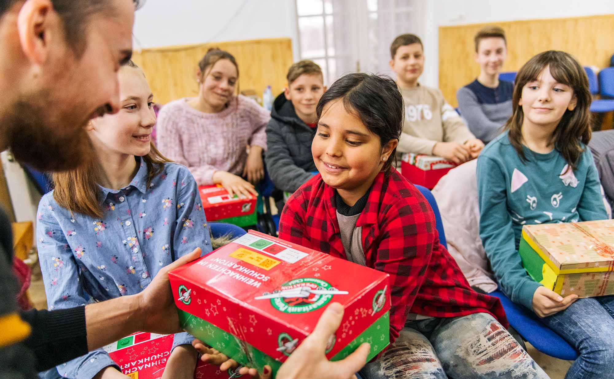 Child receiving shoebox