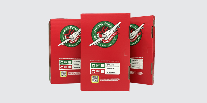 three pre-printed shoeboxes