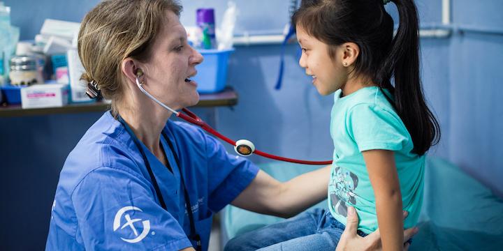 Medic and young girl