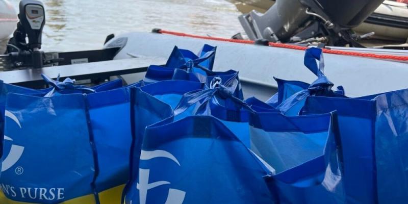 Samaritan's Purse flood relief bags ready to be delivered by inflatable boat to flood victims in Kherson