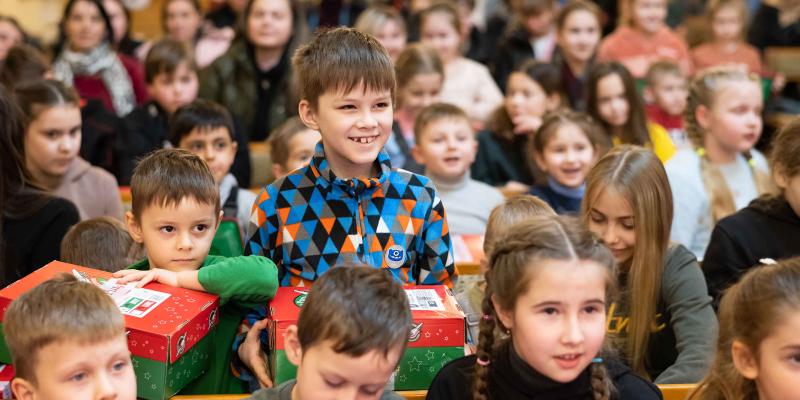 group of children with shoebox gifts