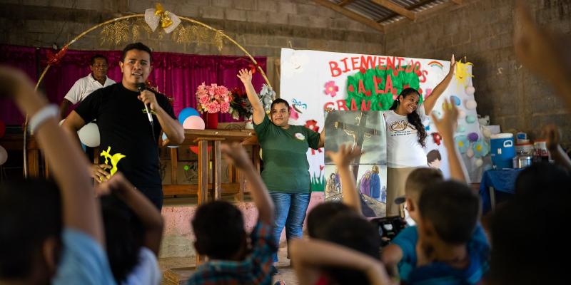 Children learn about Jesus during a child-friendly Gospel presentation.