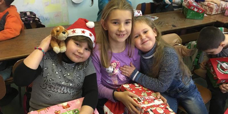 Girls enjoying their shoebox gifts together