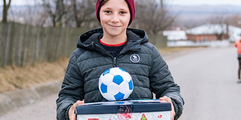 Teenage boy with football