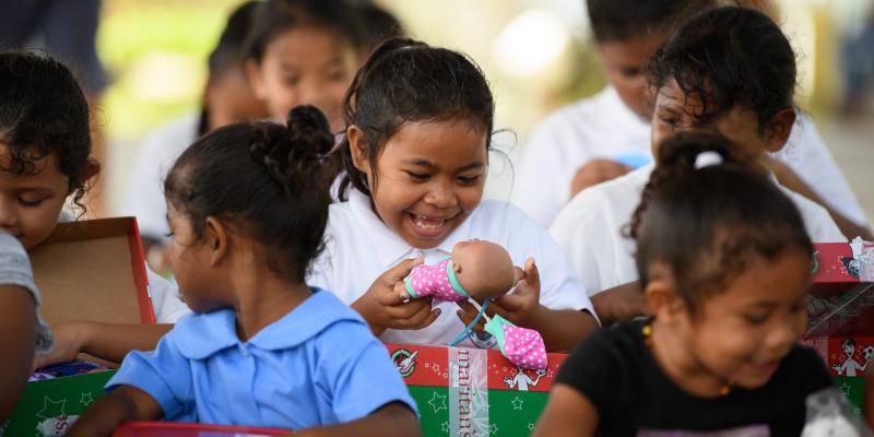 Girl happy to see her doll