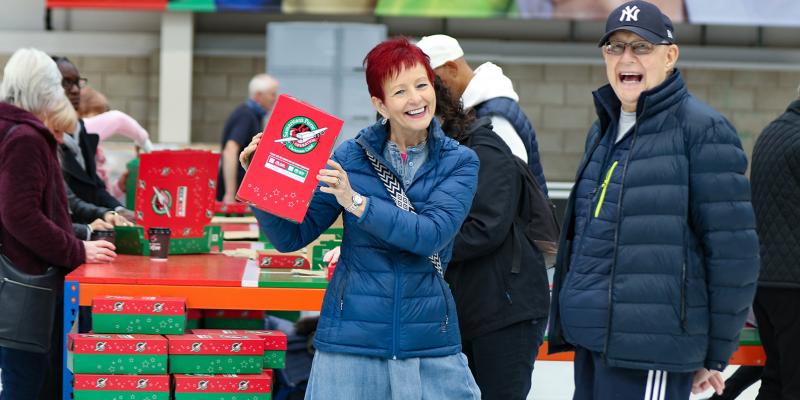 Volunteers smiling for a photograph