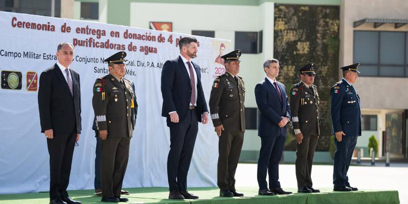 Edward Graham, chief operating officer, and Dave Philips, deputy director of international projects for Samaritan's Purse, stand with Mexican leaders at the recent handover ceremony.