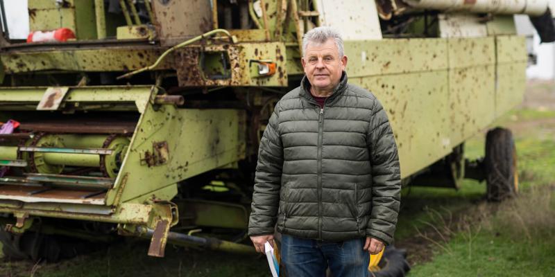 Oleksiy, a longtime Ukrainian farmer, is pleased to be working his fields again. Since Russian occupying forces retreated from his region, Samaritan’s Purse helped Oleksiy sow hope for his country by restoring the grain storehouse that appears behind him.