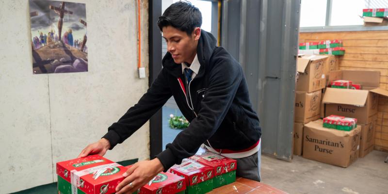 Johan arranges shoebox gifts for other boys and girls.