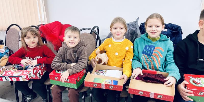 Big smiles for these children as they receive their shoeboxes!