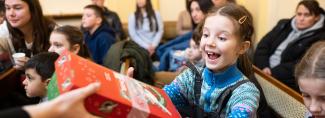 child receiving shoebox