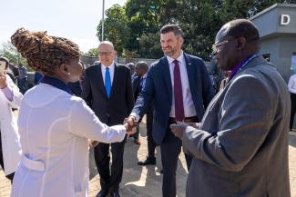Edward Graham with Scott Hughett (at left), director of World Medical Mission, attended the dedication ceremony at Tenwek on Oct. 24.