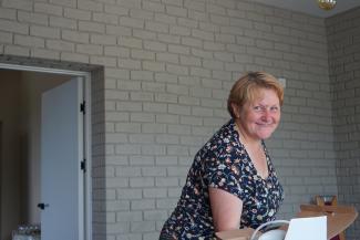 Olha welcomes her community to her home for prayer, worship, and spiritual reflection.