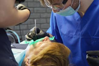 Receiving dental treatment is a blessing from God for Olha and many other Ukrainians living near the frontlines.