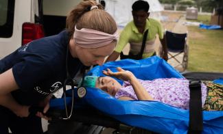 A mother of two named Su Su Hlaing waves with appreciation for the opportunity to be one of the first patients Samaritan’s Purse teams operated on in Myanmar.