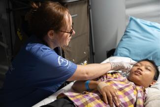 Patients at the Emergency Field Hospital in Myanmar receive personal care from our medical staff.