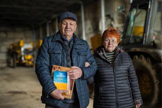 Ivan and his wife are grateful for Samaritan’s Purse gift of a New Testament in Ukrainian.