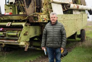 Oleksiy, a longtime Ukrainian farmer, is pleased to be working his fields again. Since Russian occupying forces retreated from his region, Samaritan’s Purse helped Oleksiy sow hope for his country by restoring the grain storehouse that appears behind him.