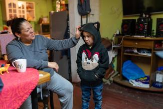 “Now, I take care of my kids,” Karol said. “We are a new family.”