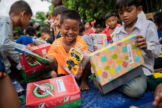A fun, full, and personalised shoebox gift delights one of the over 1.5 million children in Cambodia who have received an Operation Christmas Child shoebox since 2000.