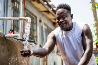 Prince enjoys the gift of clean water.