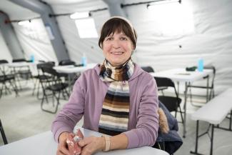 Sofia, a devout Christian, comes to one of the tents regularly to serve vulnerable Ukrainians.