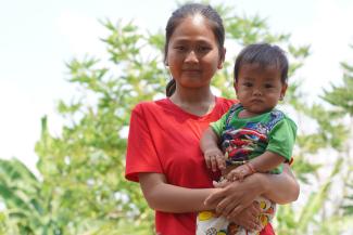 Oeurn sees how her 11-month-old, who received the benefits from her training from Samaritan’s Purse at an earlier age, is healthier and more developed than her older child.