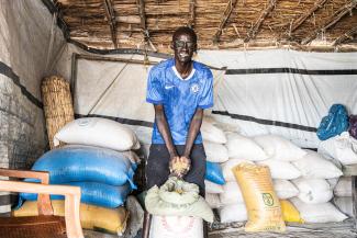 Out of his excess, John has opened a seed vending store in his community. With profit from his store, he can make sure his children are well fed and go to school.
