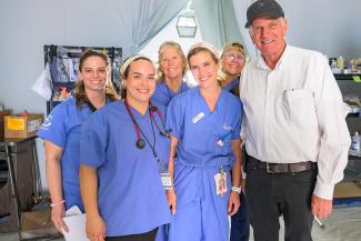 Graham met with staff at our Emergency Field Hospital in La Guaira where we have treated thousands of patients.