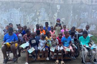Children of deaf and mute parents gather for one of the 12 Bible lessons of The Greatest Journey in Nzeng-Ayong.