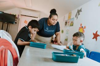Elena has used her God-given gifts to care for children while their mothers are receiving much-needed healthcare.