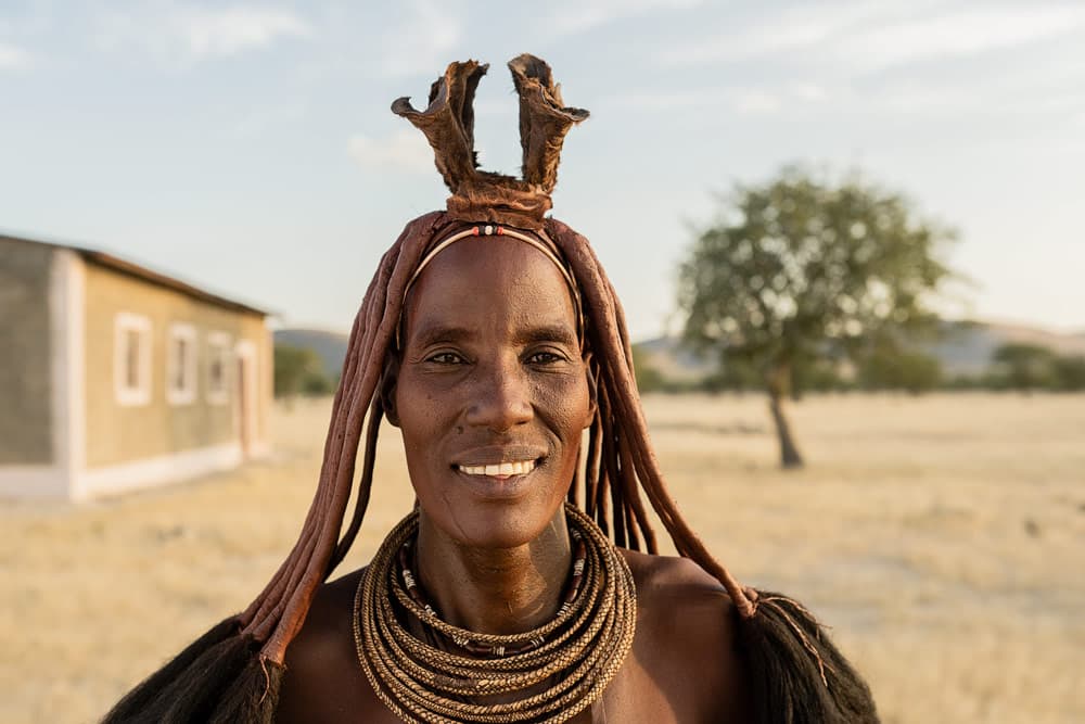 Karituu standing in front of her church