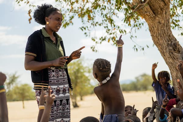 Alma and a very interested child