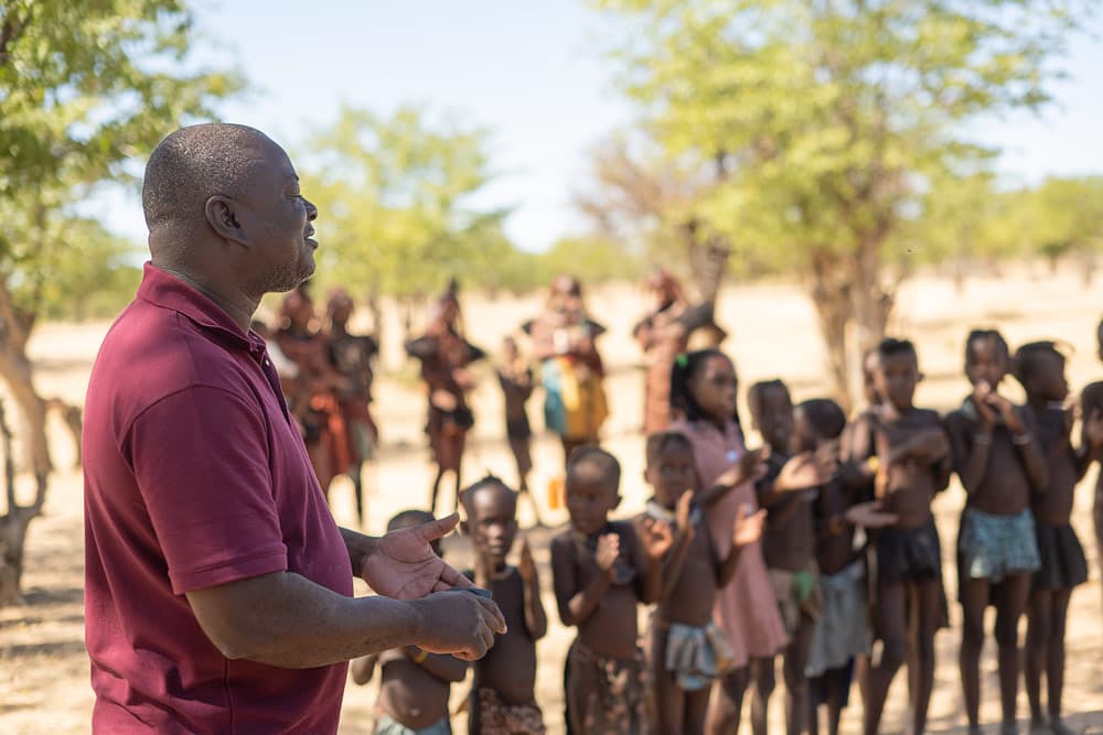 Pastor Rizera talking to the HImba in one of their villages
